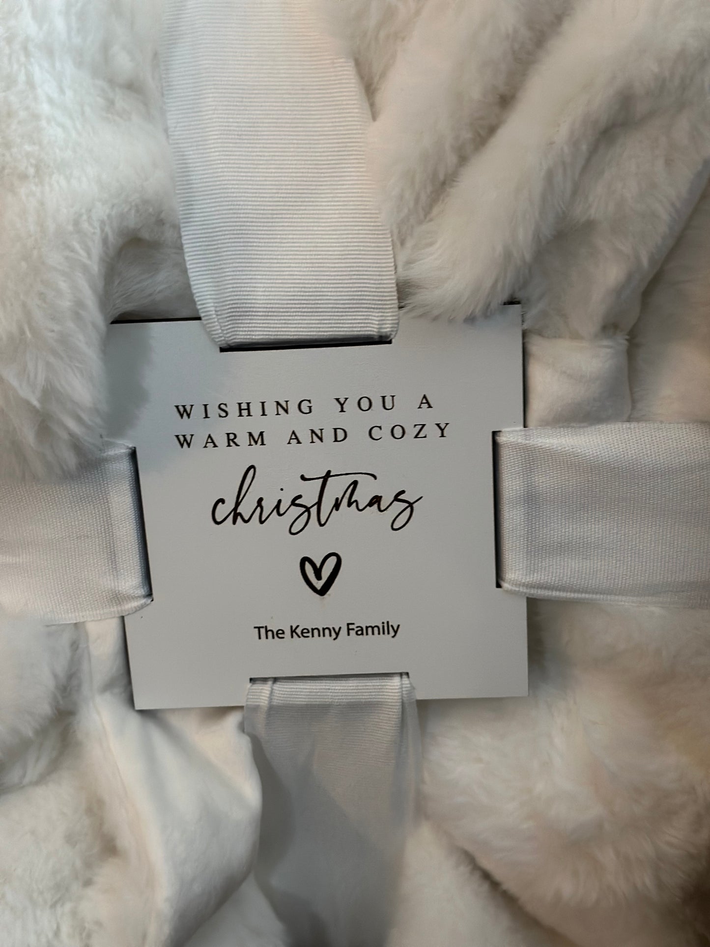 Cozy blankets with personalized tag